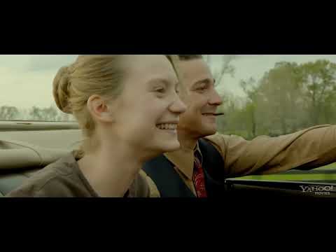 Trailer image: night run with headlamps off down a gravel road, shotgun on the bench seat