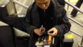 Ming- Paper Cutting Portrait in NYC Subway