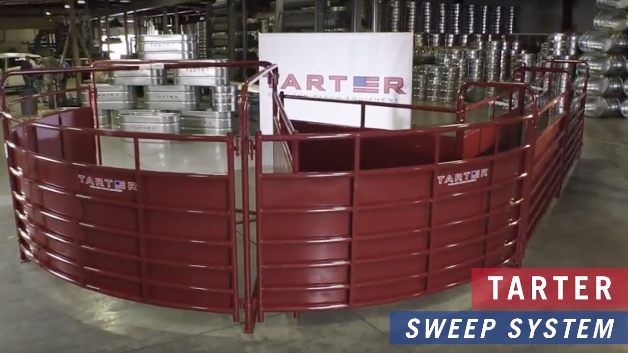 Tarter’s 180 x 20 cattlemaster open-sided sweep system with man working the sweep. 