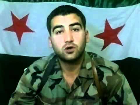 بيان يلقيه الملازم علاء الحسين باسم كتيبة شهداء جبل الزاوية