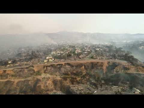Drone footage shows devastation from the Pacific Palisades Fire in California..mp4
