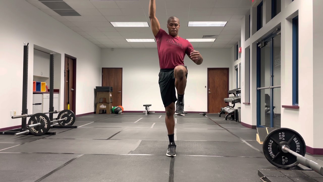 Single Arm Dumbbell Overhead March - YouTube