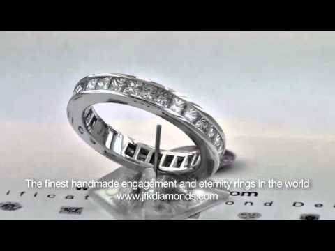2 carat channel set princess cut diamond full eternity ring set in 18ct white gold.