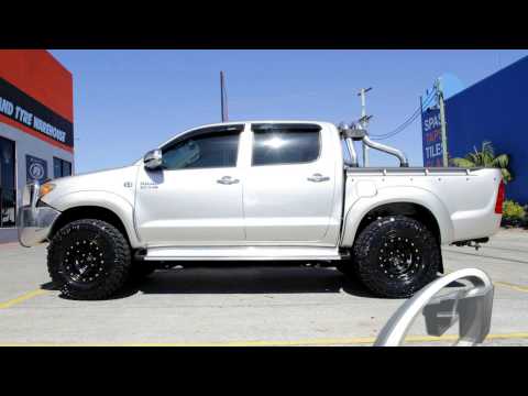 Toyota Hilux Custom Rims + Nitto Trail Grappler 285/75R16 Tires