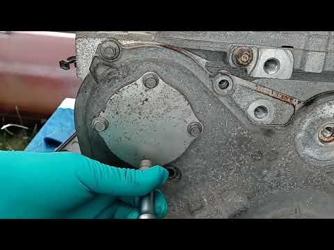 GM Ecotec 2.2 L engine timing chain cover removal / oil pump removal