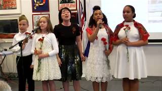 Sunshine kids sing for the WWII Veterans