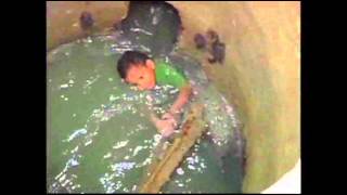 Raw Video: Boy Rescued After Falling Into Sewer