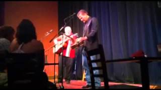 Rob Ickes on Dobro and Jim Hurst on guitar and vocals; various locations