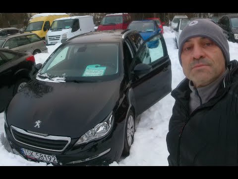I'M WATCHING IT. STARTS NICELY. PEUGEOT 308. HUGE TRUNK. COMFORTABLE SEATS. GOOD HDI ENGINE.