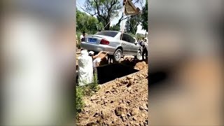 Chinese man buried in his car as dying wish is granted