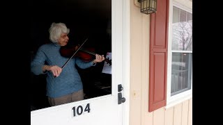 Local music students gather together in song on Sunday as they play 