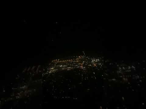 Flight takeoff at night and rain from Seattle, Washington, US
