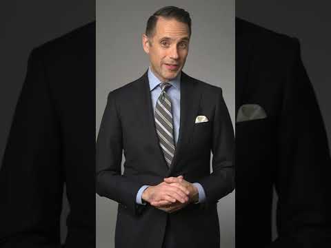Part of a video titled How To Properly Button a Suit Jacket - YouTube