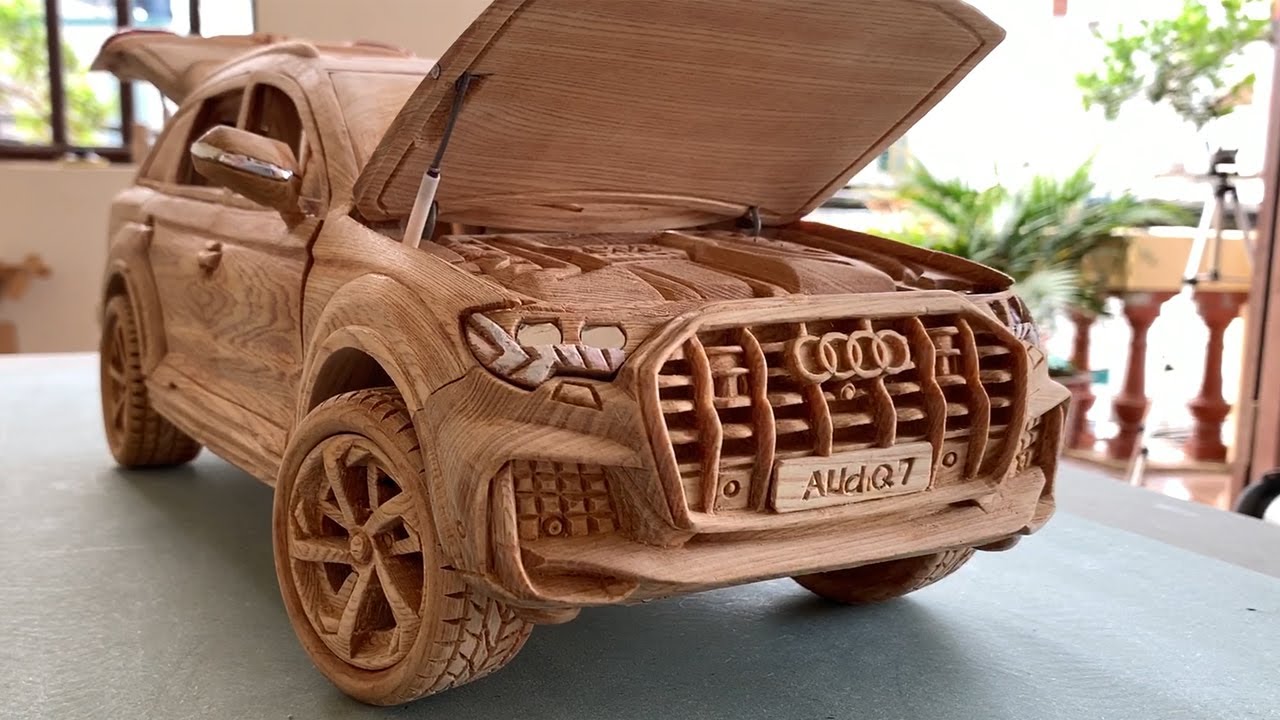 sculpture of audi q7 2021 car by wood working art