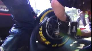 Red Bull racing F1 mechanics celebrate their Max Verstappen pitstop at