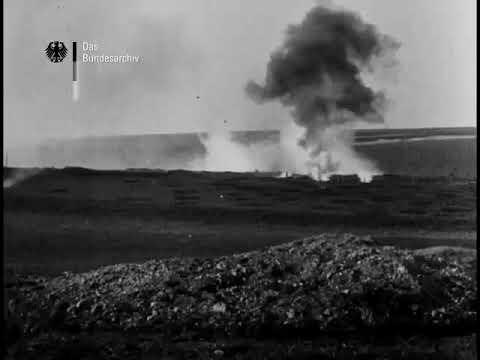 WWI - German Sturmtruppen and Flammenwerfer Pioneers assault enemy trenches with Artillery support