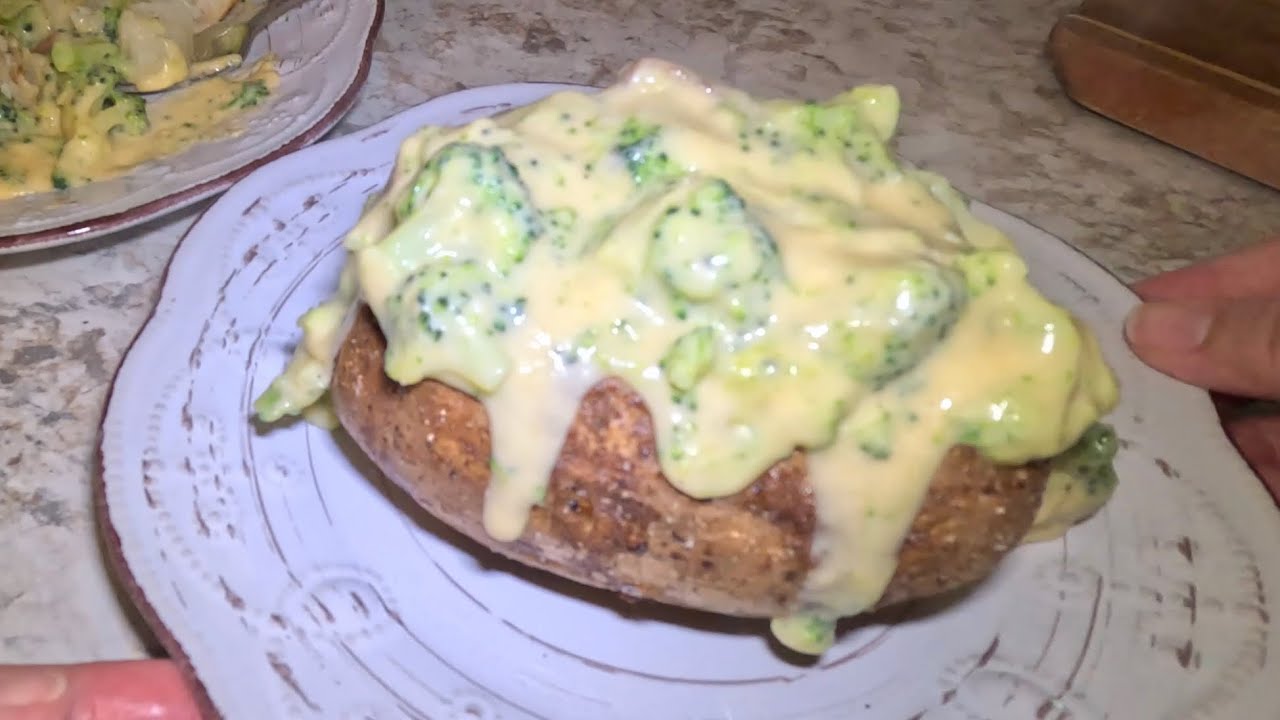 Broccoli & Cheese Stuffed Baked Potatoes! Amazing Cheese & Broccoli Sauce Poured Over A Baked Potato