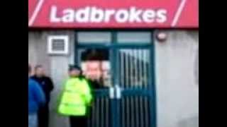 Man dies in masked gun robbery at Ladbrokes bookmaker in Plymouth
