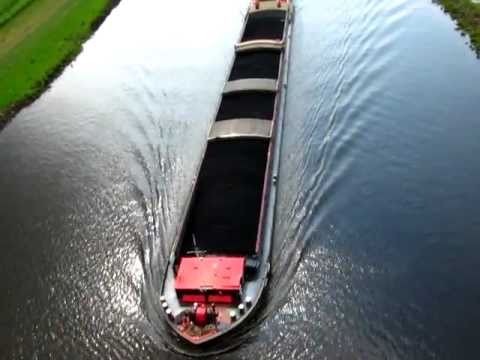 Vorbeifahrt Binnenschiff Reimar - GMS - 04401530 unter Autobahnbrücke A29