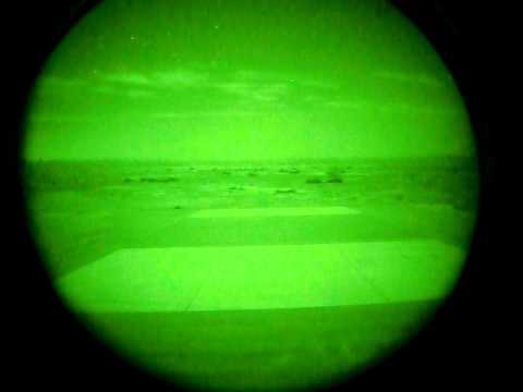 AC130 firing 105mm Howitzer through NVG