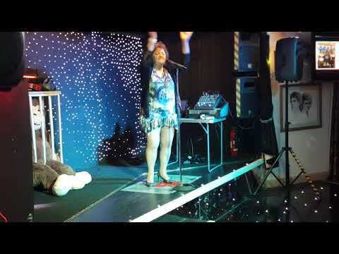 "Paradise" sung by Christine Lee Jones