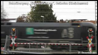 preview picture of video 'Bahnübergang Ziegelhüttenweg, Osthofen ++ Taurus vor EuroCity 7 ++ Anlagentyp BÜS72'