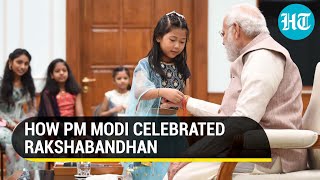 PM Modi celebrates Rakhi with daughters of PMO staffers I Watch