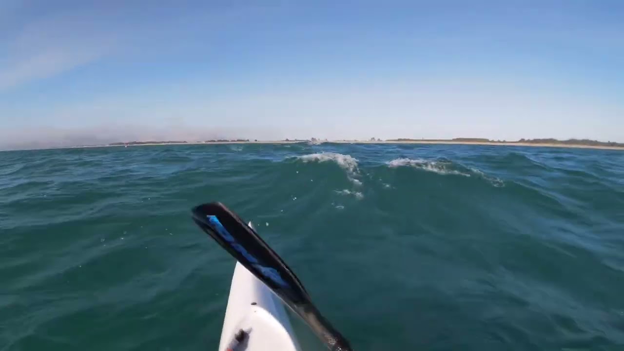 Downwind off the beach. NE wind small swell sweet background tunes