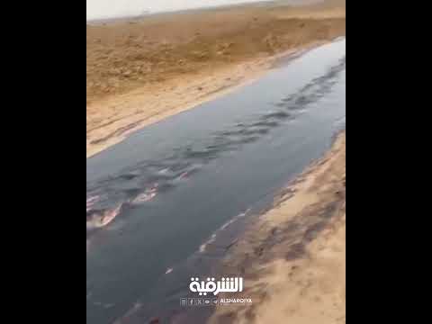 شاهد بالفيديو.. مُزارع في محافظة صلاح الدين يتبرع بحصته من النفط للعراقيين بعد اقتحام سيول نفطية مزارعه !