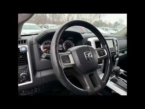 2011 Ram 1500 4WD Crew Cab 5.7 Ft Box Sport in Black for sale at Finch Chrysler Dodge Jeep Ram Ltd in London, ON