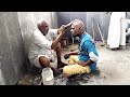 Young Men Headshave By Old Barberman