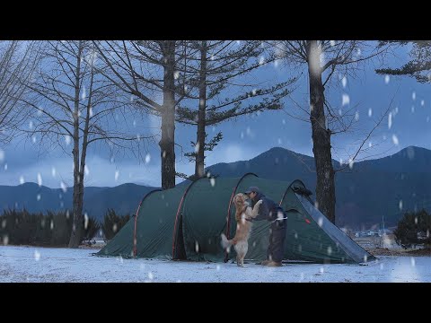 [320] With my big dog and three men on a cold winter day.