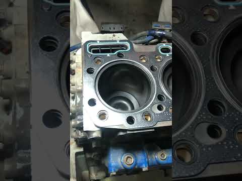 Cat C15 or Perkins 2000 series Head gasket installation in progress