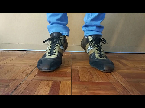 Bikkembergs brown sneakers and blue skinny jeans