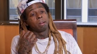 Lil Wayne stands by his 'no such thing as racism' comment.