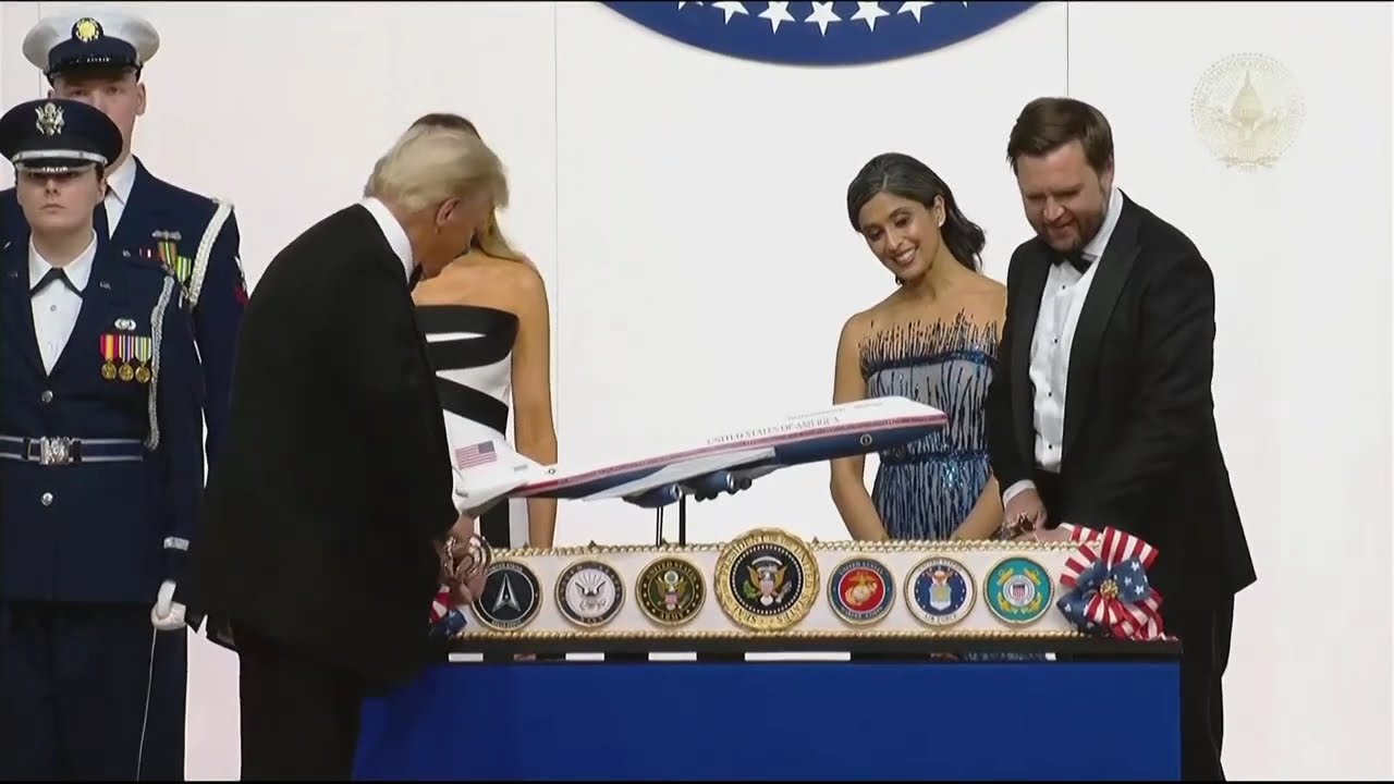 Donald Trump dances with sword after he and JD Vance cut cake at Commander in Chief inaugural ball