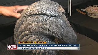 Native American artist Eddie Morris shows off his artwork