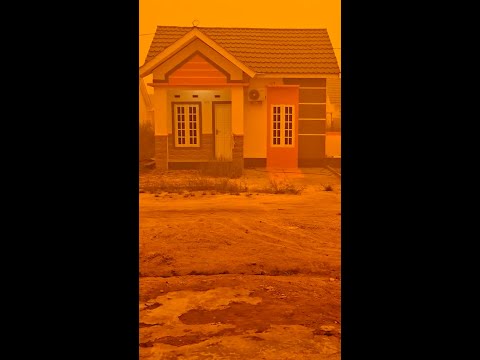 Wildfire smoke covers Indonesia skies in orange haze