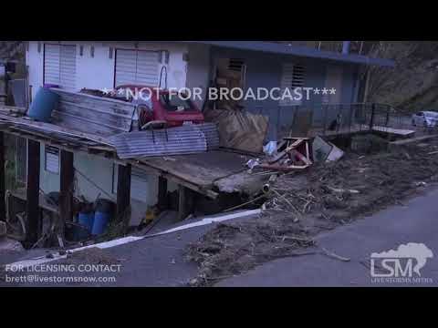 10-2-2017 El Yunque rainforest destroyed by Hurricane Maria, people doing laundry in river, extreme