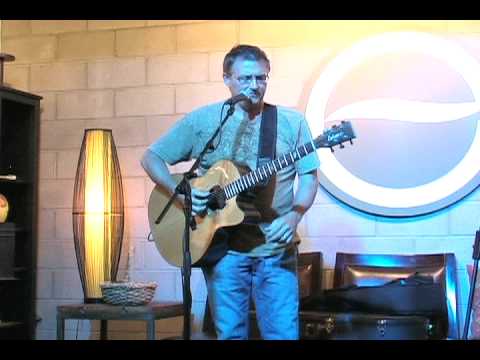 Bill.Dutcher a modern acoustic guitarist performing at a open mic in Arizona