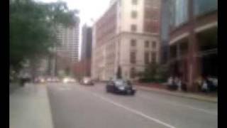 preview picture of video 'Obama's motorcade in downtown Kansas City MO'