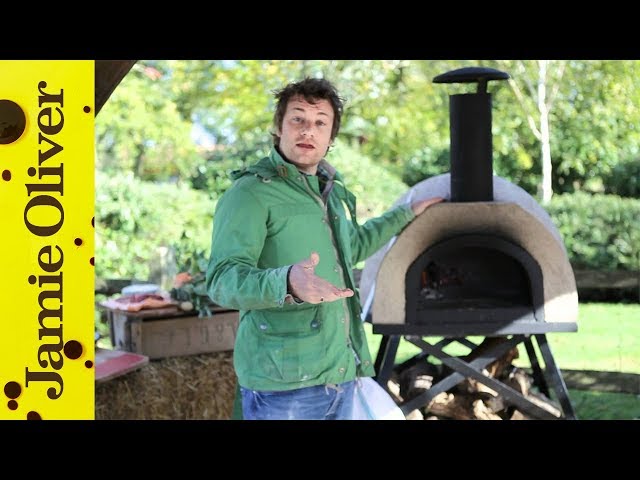 How to cook pizza in a wood fired oven video | Jamie Oliver