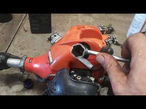 * Echo srm 225 weedeater spark plug change. echo spark plug change.