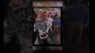 Nelly leading Ashanti through the crowd at fight night #nelly #ashanti