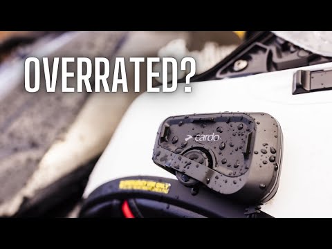 I bought the Cardo Freecom 2x. (So you don't have to.)