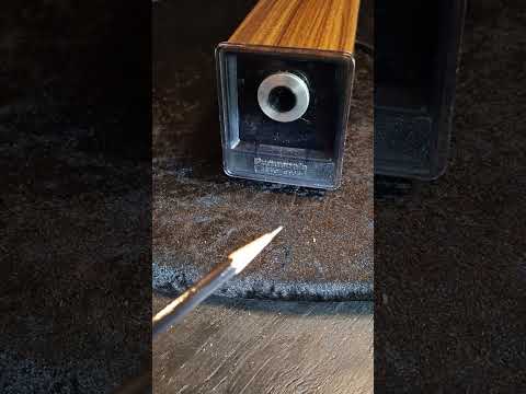 Vintage Panasonic KP-77 Auto-Stop pencil sharpener demonstration