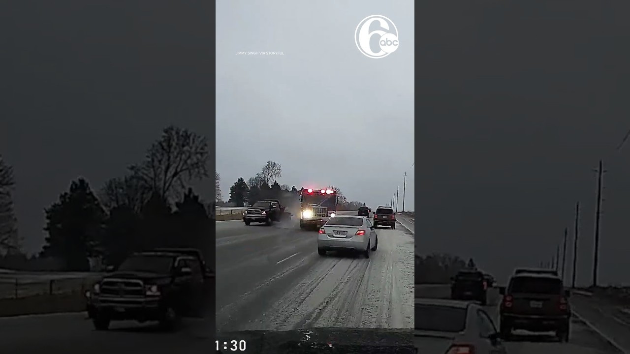 Speeding firetruck narrowly misses oncoming car, footage shows