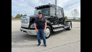 A preview image of the linked video showcasing 2024 Freightliner M2 112 Laredo