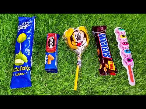 Satisfying video Asmr lollipops candy and chocolate gummy candy unboxing video Asmr