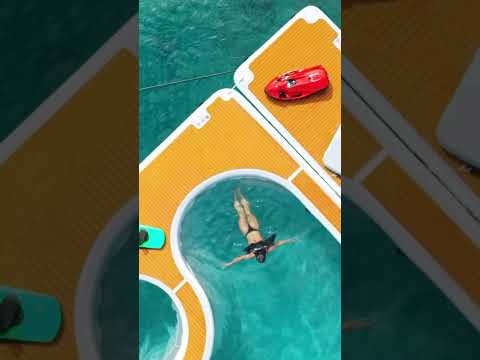 This Inflatable Platform Lets You Walk on Water Beside Your Yacht 🤯 | Dockee